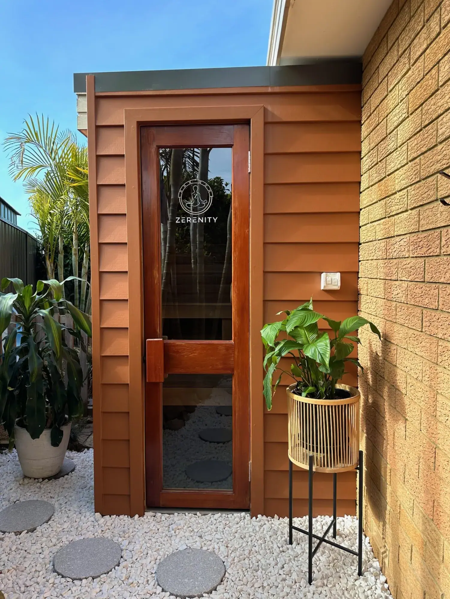 Completed custom cedar sauna fitted into a Sydney side yard