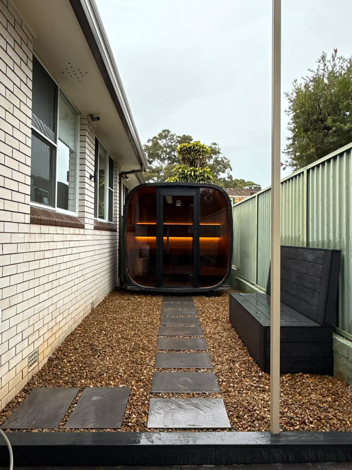 Koda installed at the end of a garden path