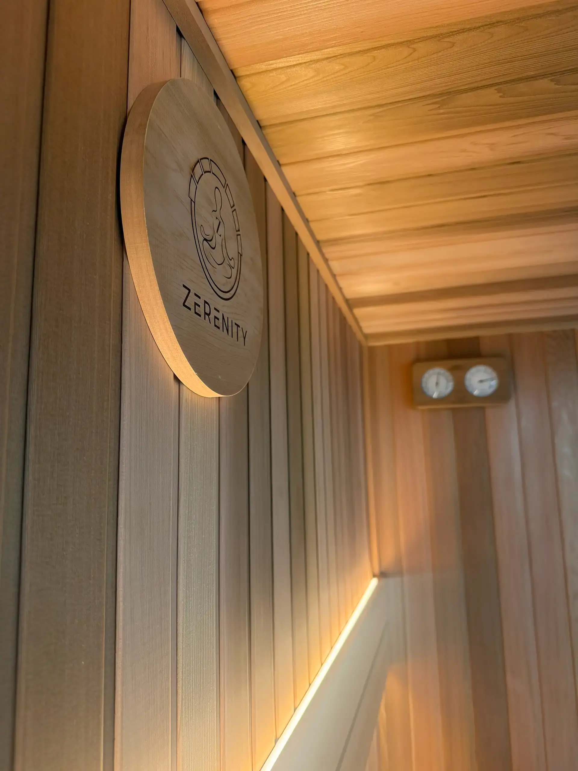 Warm cedar sauna interior built by Zerenity